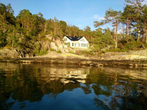  Ropeid Villa Fjordferie  Хебнес